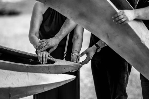 People experiencing art with their hands